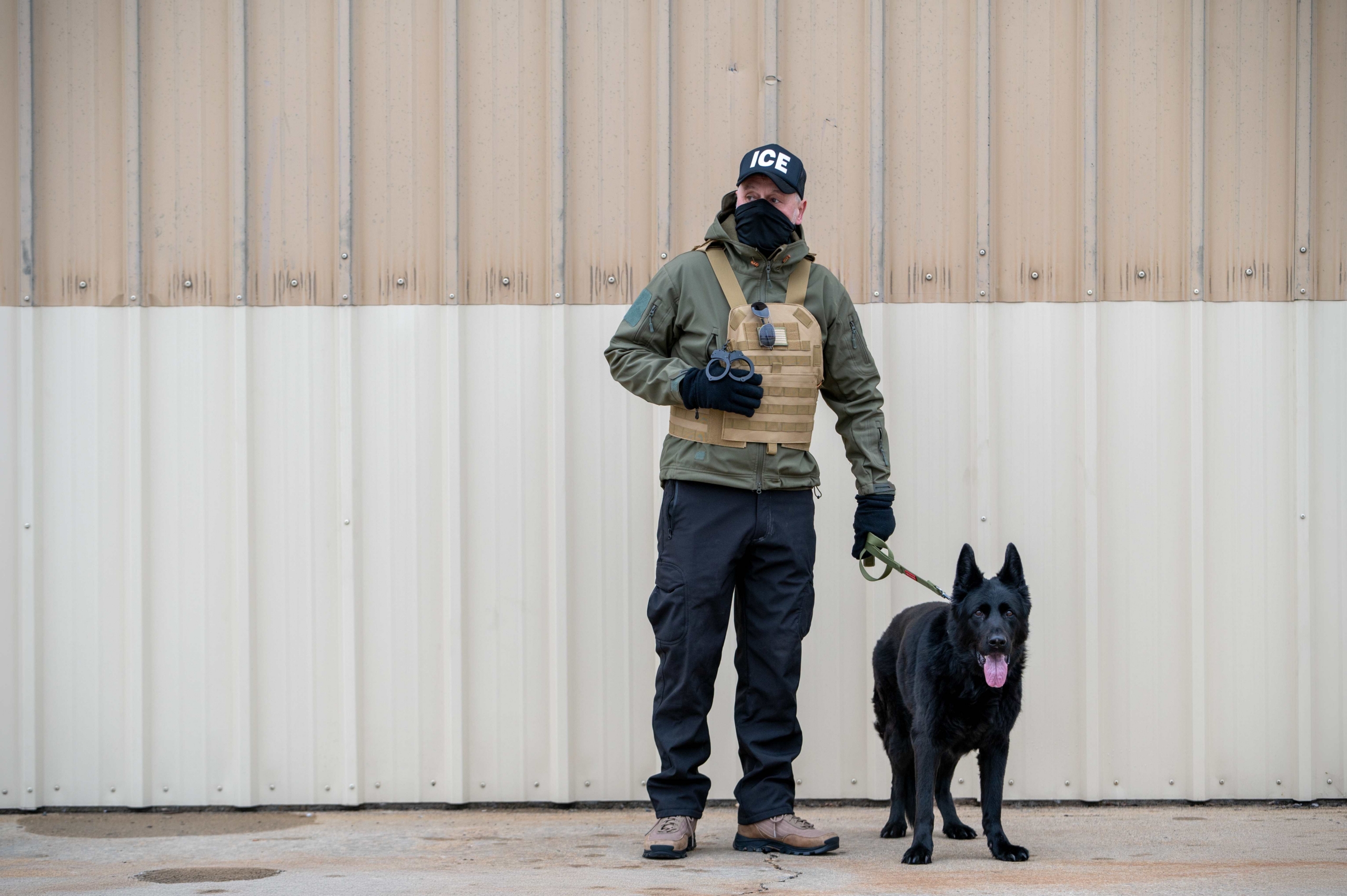 An Immigration and Customs Enforcement (ICE) officer at the airport