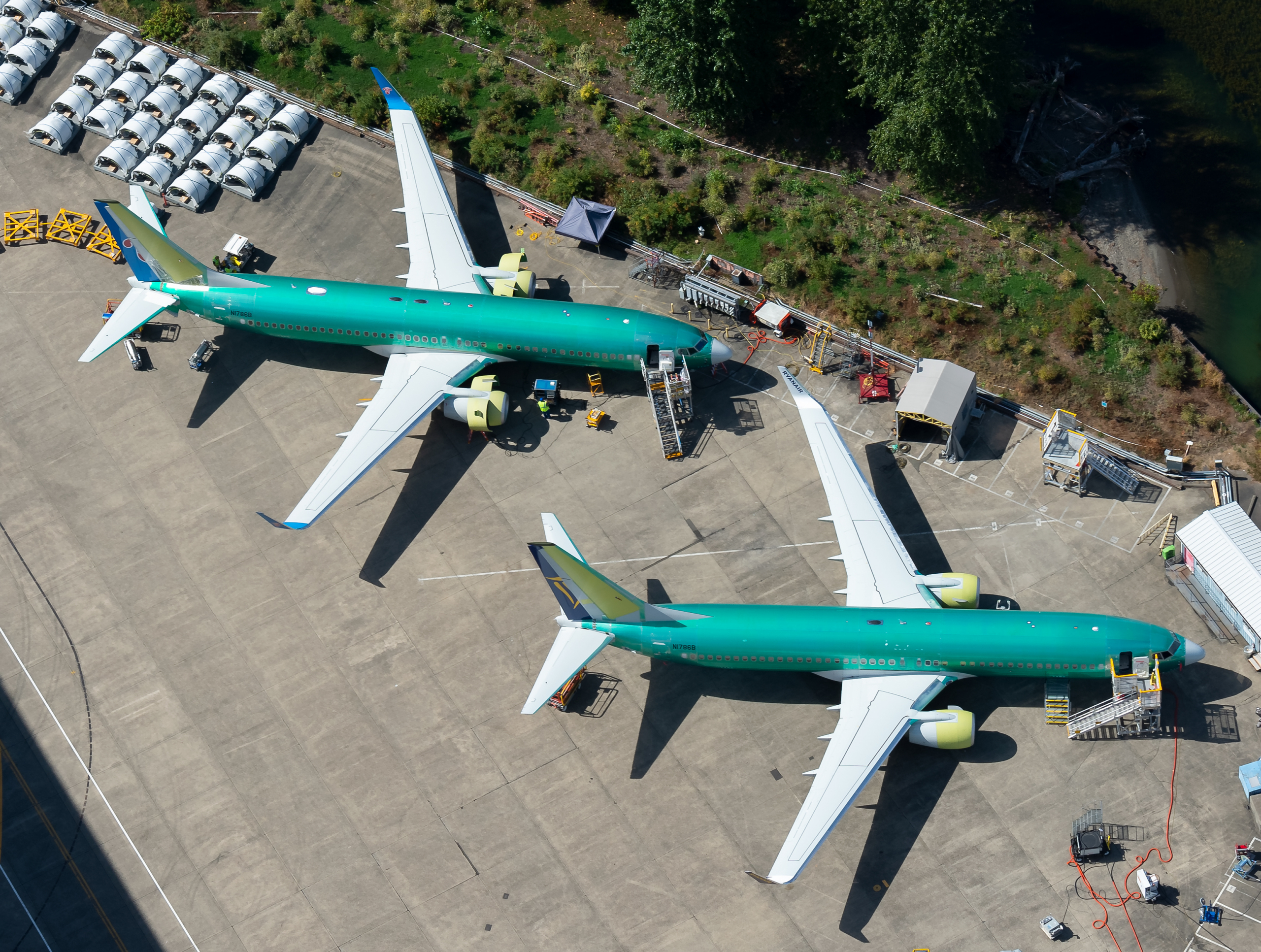 Two Boeing 737 NG parked outside the company factory at Renton Airport.