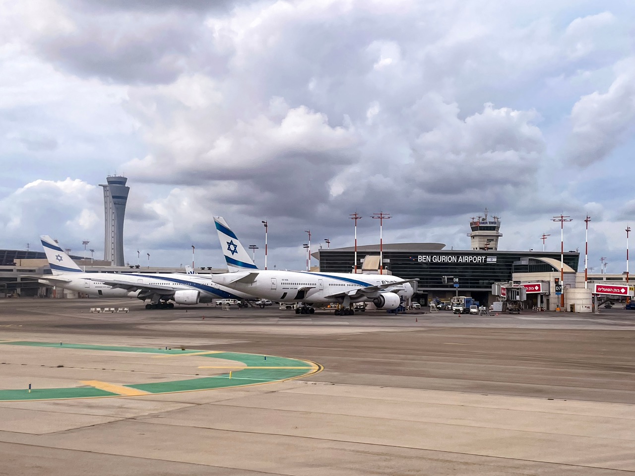 Tel Aviv, Israel - OCT1, 2023: Exterior view of the TLV Ben Gurion International Airport and El-Al planes parked on the apron.
