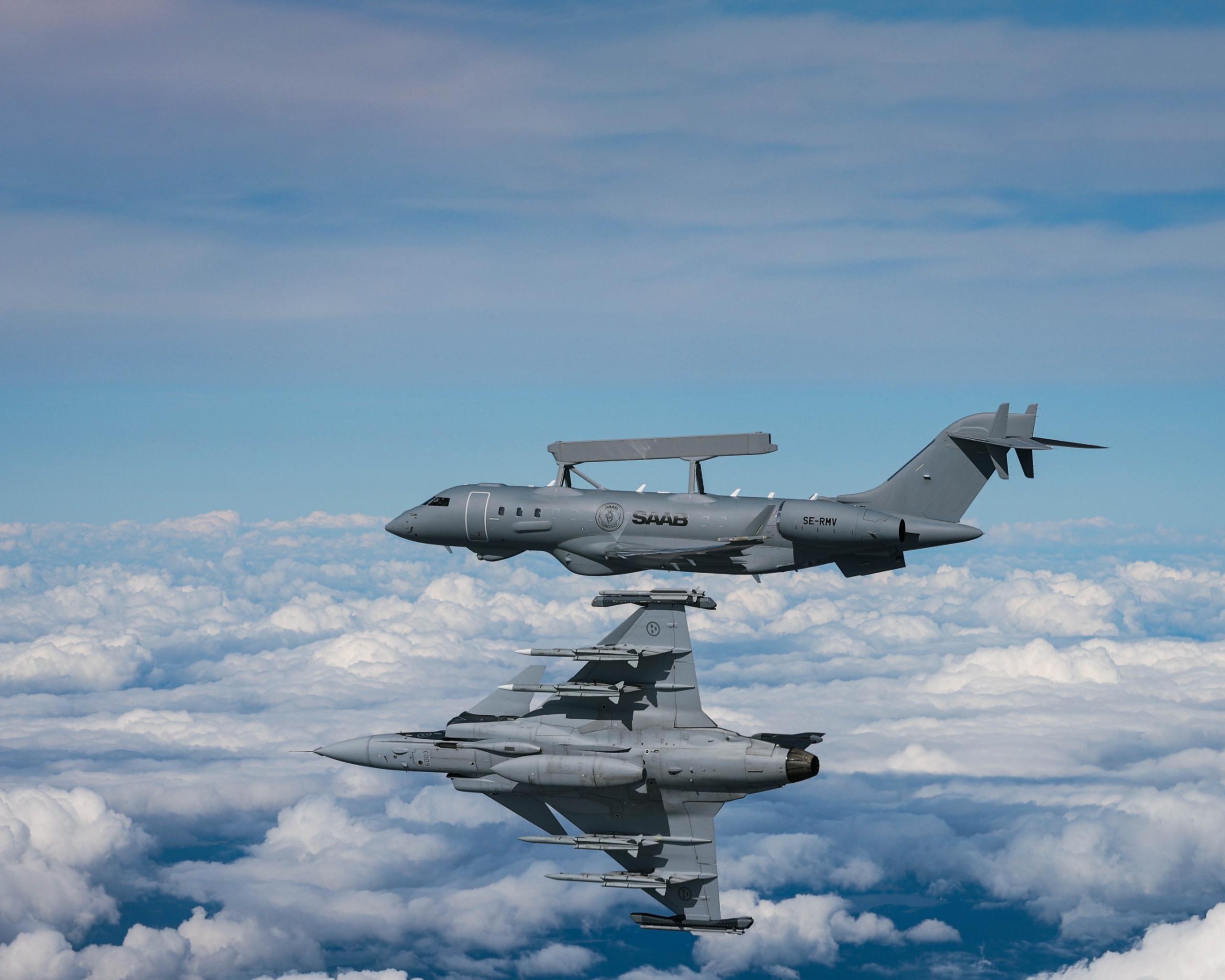 Saab GlobalEye Airborne Early Warning & Control (AEW&C) aircraft with Saab Gripen E fighter alongside