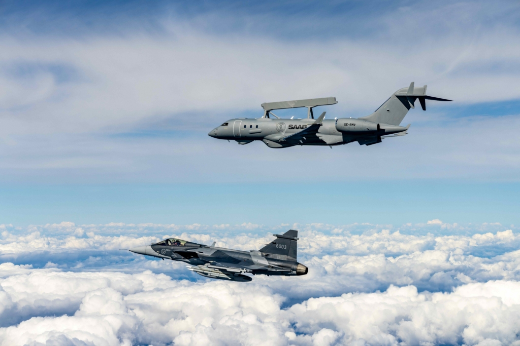 Saab GlobalEye Airborne Early Warning & Control (AEW&C) aircraft with Saab Gripen E fighter alongside