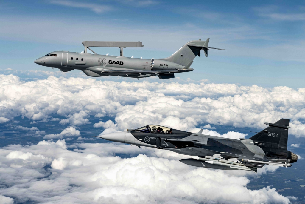 Saab GlobalEye Airborne Early Warning & Control (AEW&C) aircraft with Saab Gripen E fighter alongside