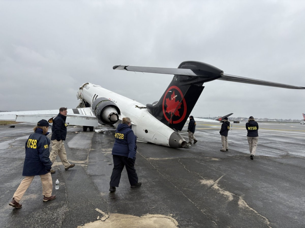 NTSB investigators on site at LaGuardia examining Air Canada Express jet
