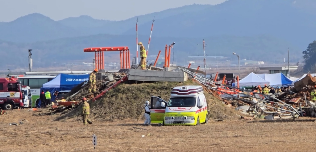 Broken concrete localizer support structure at Muan International Airport following Jeju Air flight 2216 crash