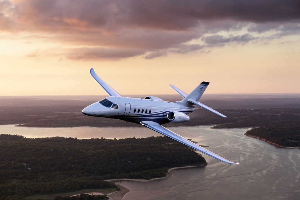 Aerial photography of the Textron Cessna Latitude business jet flying over Keystone Lake, west of Tulsa, OK.

Mid-Continent Airport (ICT)
Wichita KS USA