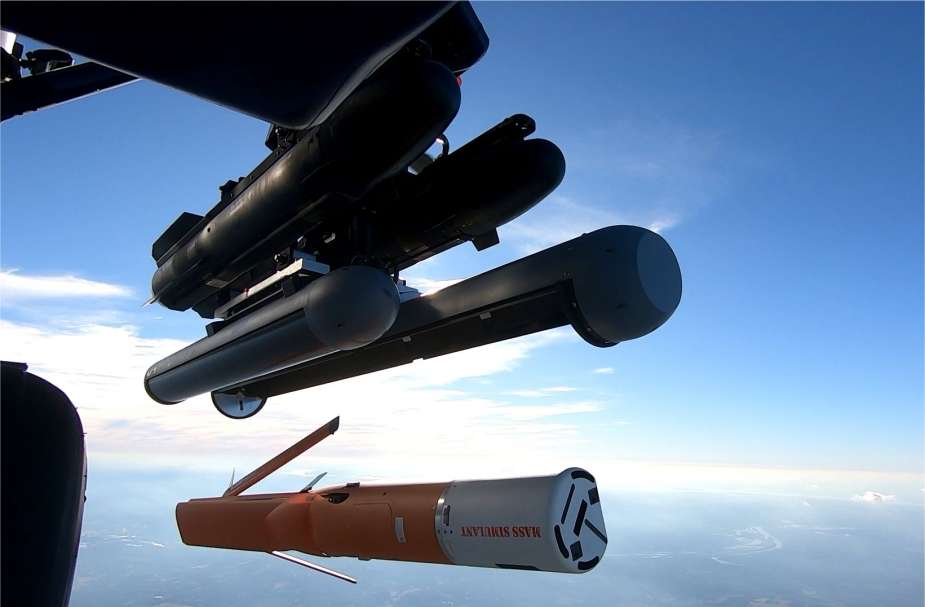 Altius 700 drone being launched from a UH-60 black hawk