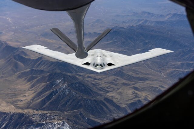 The USAF's first B-21 Raider prototype (serial AF-0001/'ED', nicknamed 'Cerberus') conducts an air-to-air refuelling trial over California with a KC-135R Stratotanker from the 370th FLTS at Edwards AFB on 10 March 2026. Image: Northrop Grumman