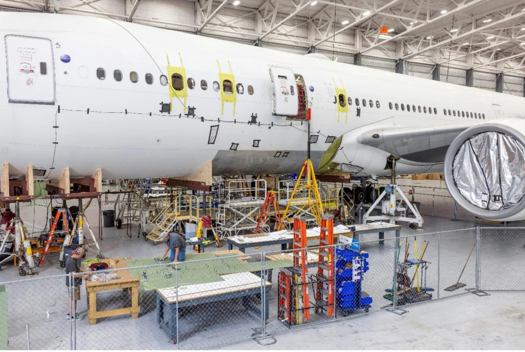 The newly widened windows along the NASA 777-200ER's fuselage will serve as viewports for a variety of scientific instrument sensors. Image: L3Harris