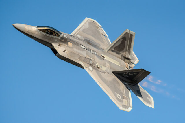 The USAF's F-22 Raptor Demonstration Team performs an air display over the Ohio River during the Thunder Over Louisville Air Show on 23 April 2022. Image: US ANG/Dale Greer