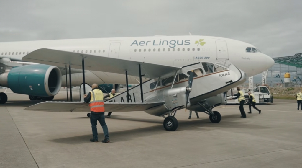 Aer Lingus Iolar Dh 84 Dragon Rapide in front of Airbus A330