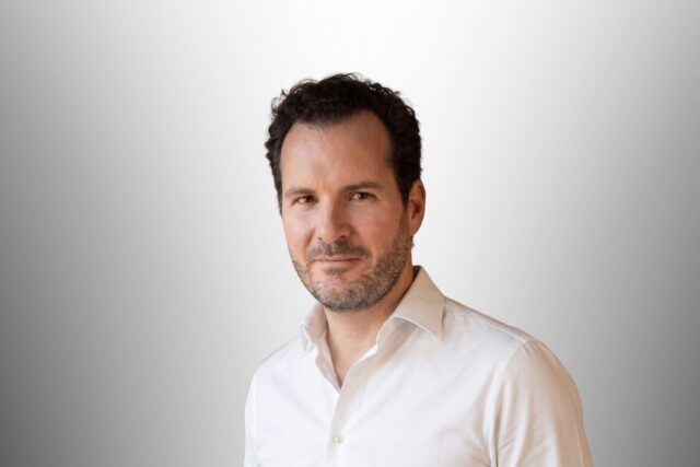 Headshot of Tanguy Morel co-founder and CEO of Moment,