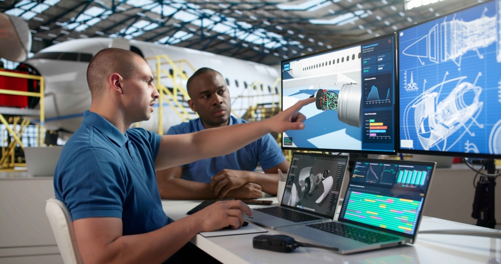 technicians overlook a digital aircraft design