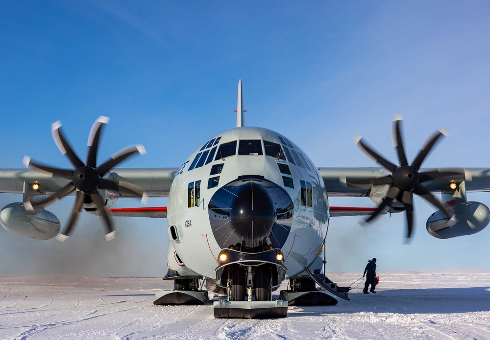 C-130 Hercules in on a blue. ice runway