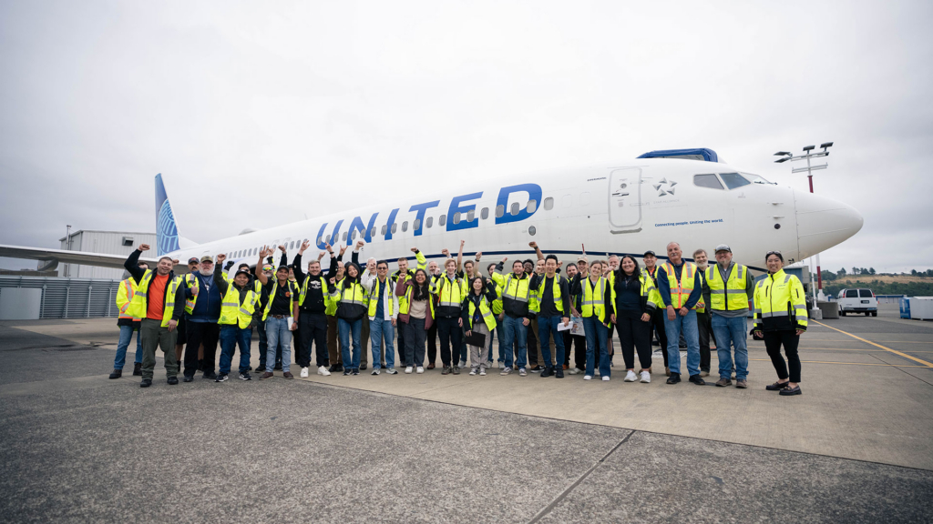 The 737-10 1G003 test crew gathers after the airplane’s final certification flight test.