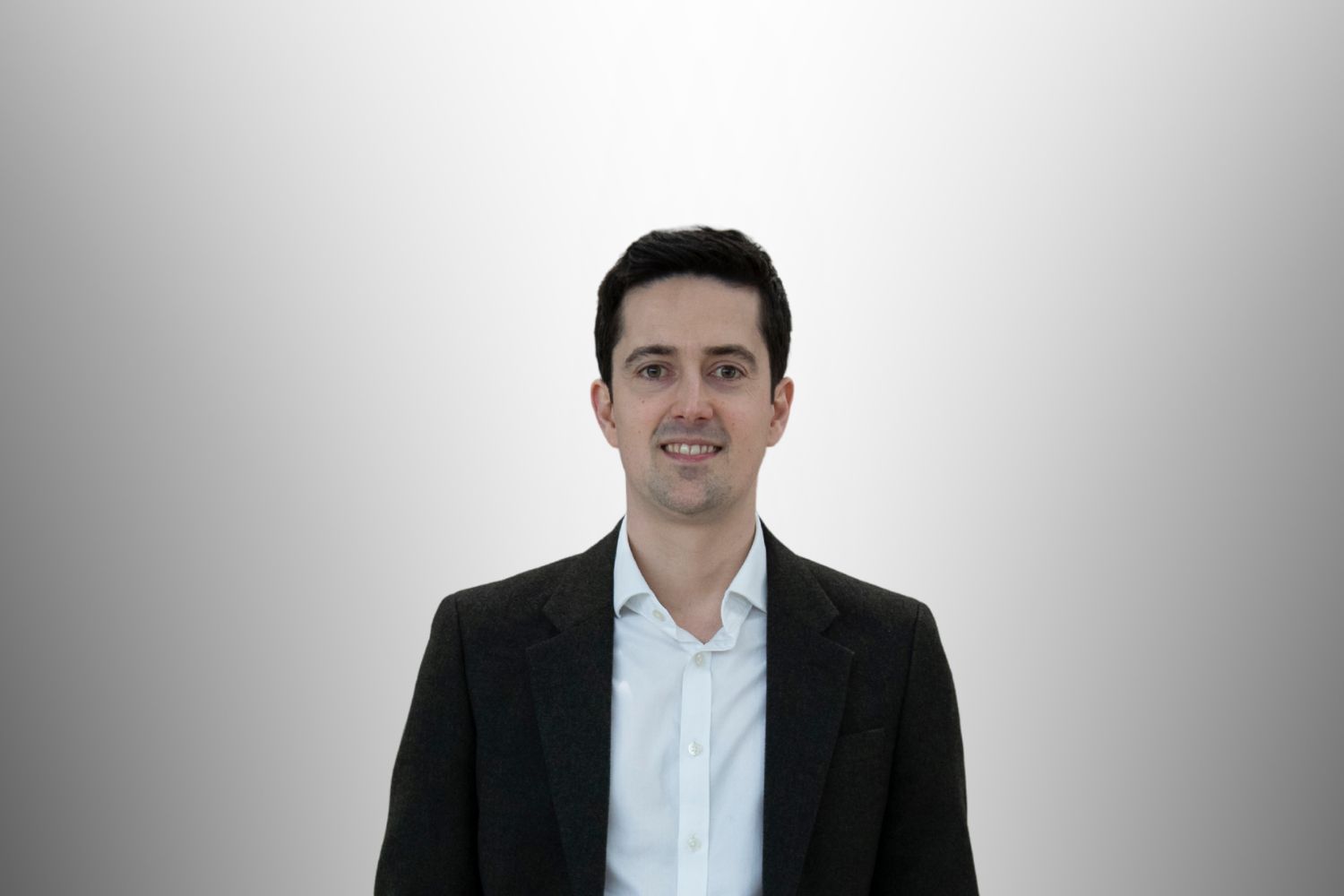 Headshot for Andrew Symes OXCCU