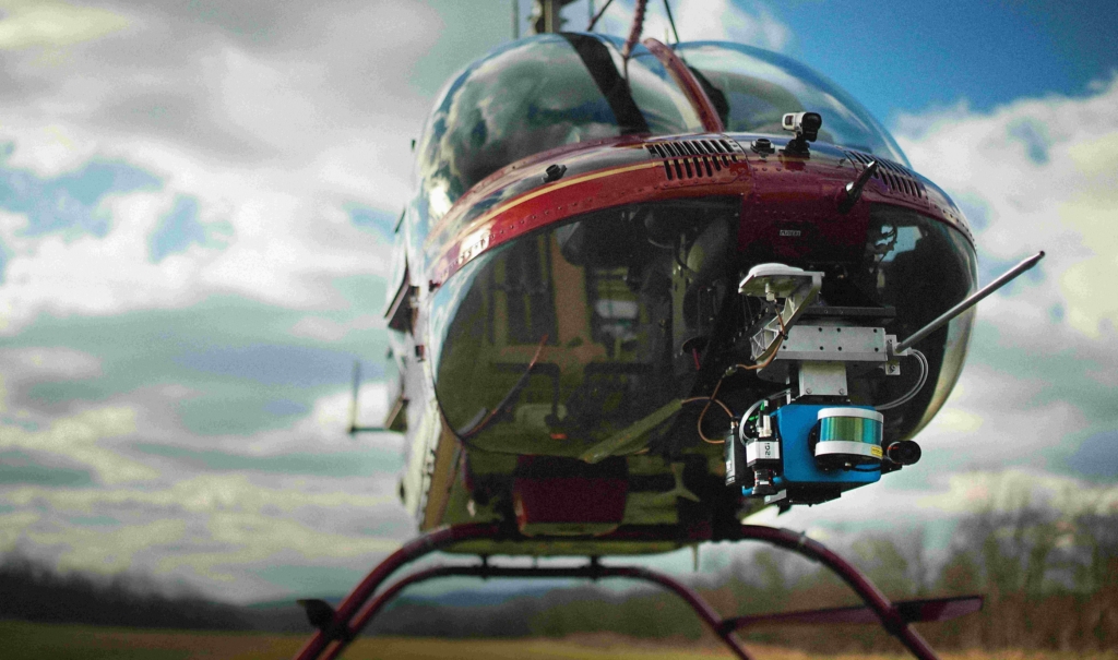 Peregrine on Red Helicopter