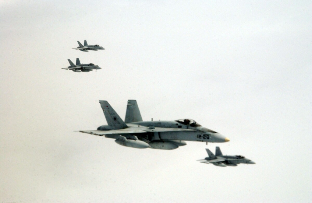 EIELSON AIR FORCE BASE, Alaska -- Spanish F/A-18 Hornets await access to a KC-135 refueler over the Pacific Alaskan Range Complex during Red Flag Alaska based here July 17. This exercise provides training for units preparing for air expeditionary force deployments. Other international partners include Japan, Mongolia, Thailand, Turkey, and NATO. (U.S. Air Force photo by Capt. Tana R.H. Stevenson)