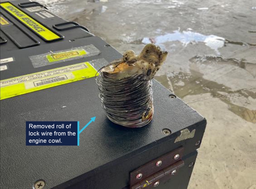 Lockwire left behind in engine cowl