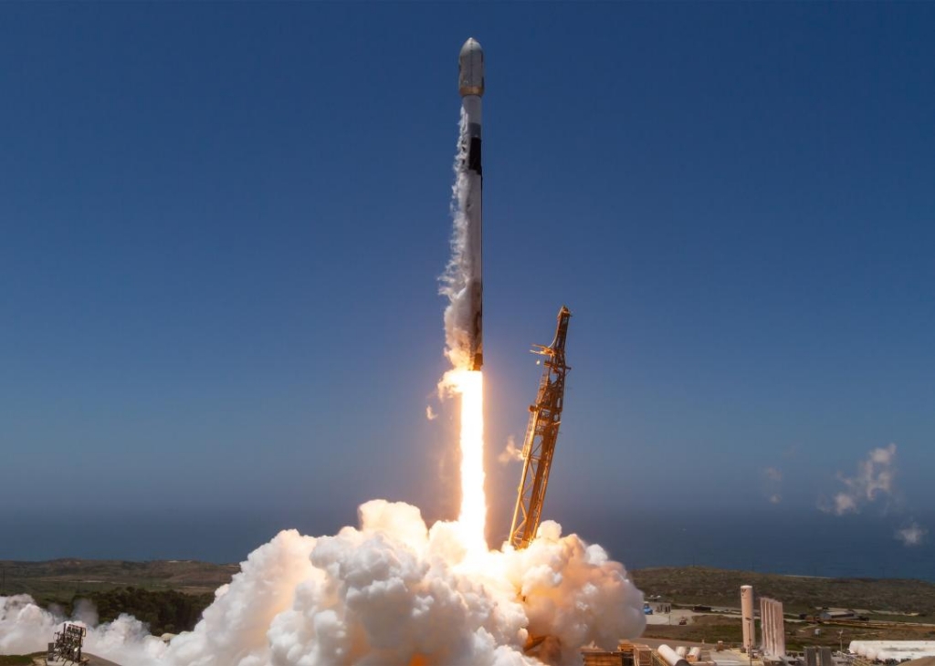 A SpaceX Falcon 9 rocket lifts off in support of a National Security Space Launch (NSSL) mission to deliver 21 Space Development Agency data transport Tranche 1 space vehicles to orbit from Space Launch Complex 4 East, Vandenberg Space Force Base, California, on July 16, 2026. SpaceX's newest task order award includes 18 Falcon 9 launches.