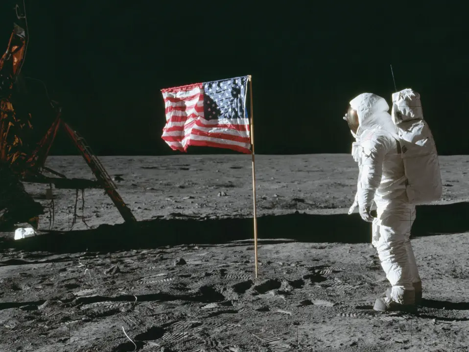 The first American flag was raised on the moon by Neil Armstrong and Buzz Aldrin during the Apollo 11 mission in 1969. Five more followed during later Apollo missions and remained on the lunar surface.