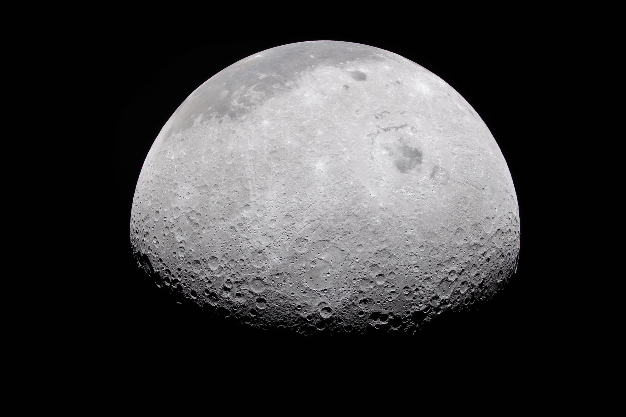 The Moon’s rocky, uneven, and otherworldly surface features are highlighted by the terminator – the difference between light and darkness.