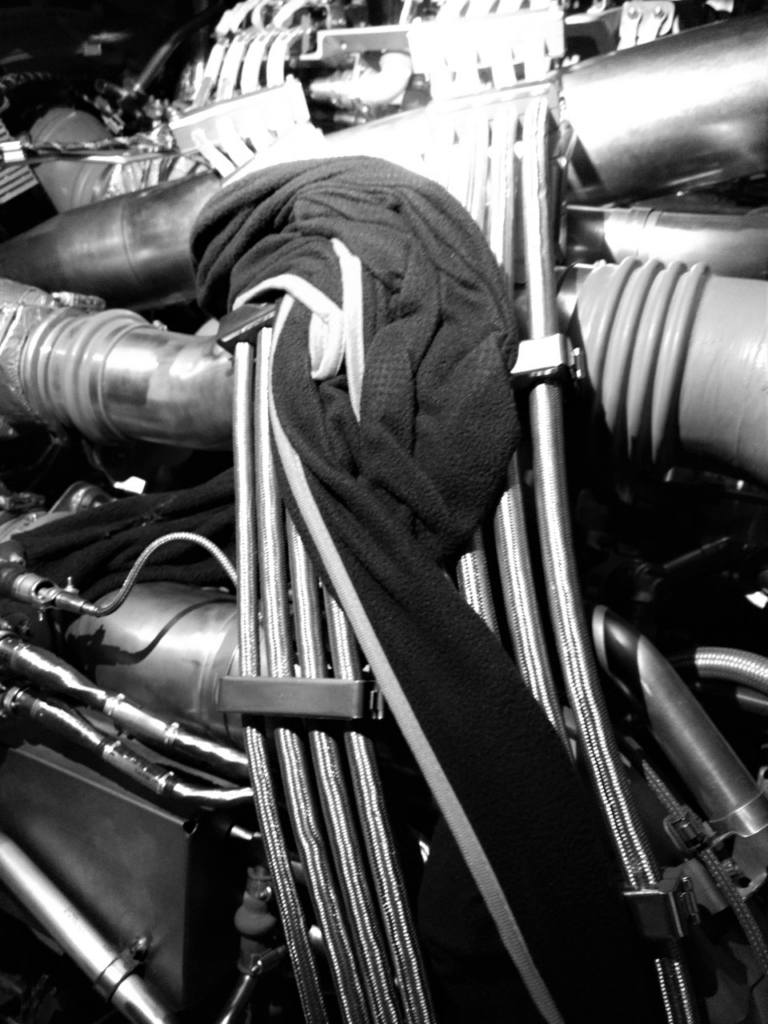 Passenger blanket left on engine