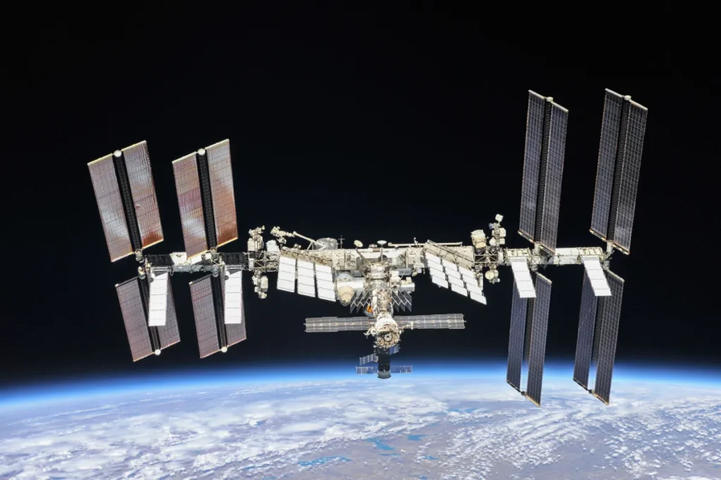 International Space Station is seen with Earth in the background.