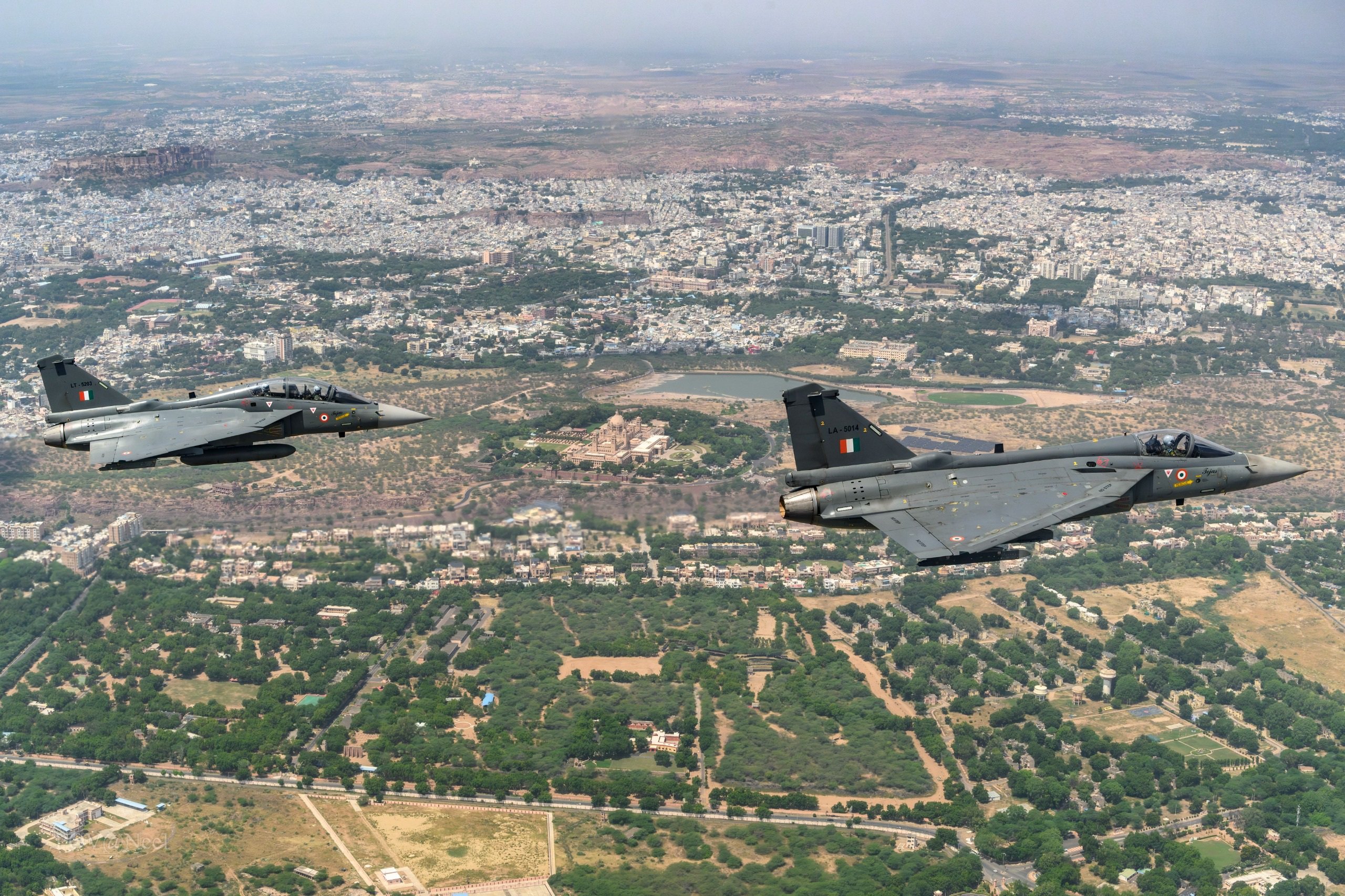 IAF Chief Air Chief Marshal AP Singh and JASDF Chief General Takehiro Morita fly in formation aboard the LCA Tejas at Air Force Station Jodhpur during Exercise Veer Guardian 2026.
