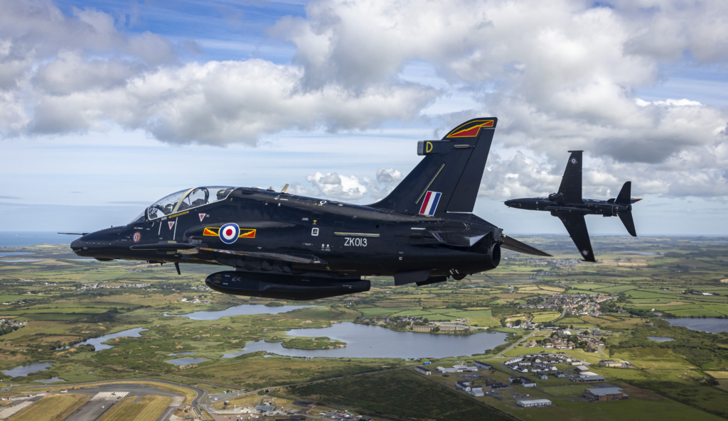 RAF Hawk T2s fly over RAF Valley