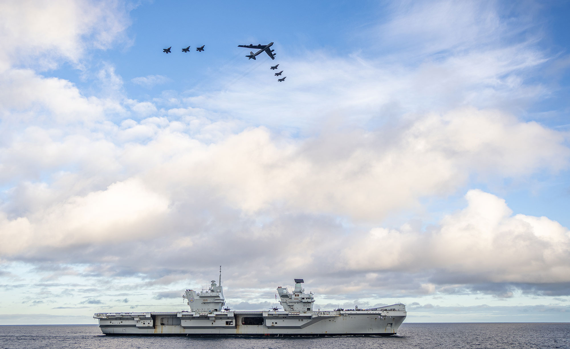 HMS Prince of Wales with B-52 and F-35s overhead