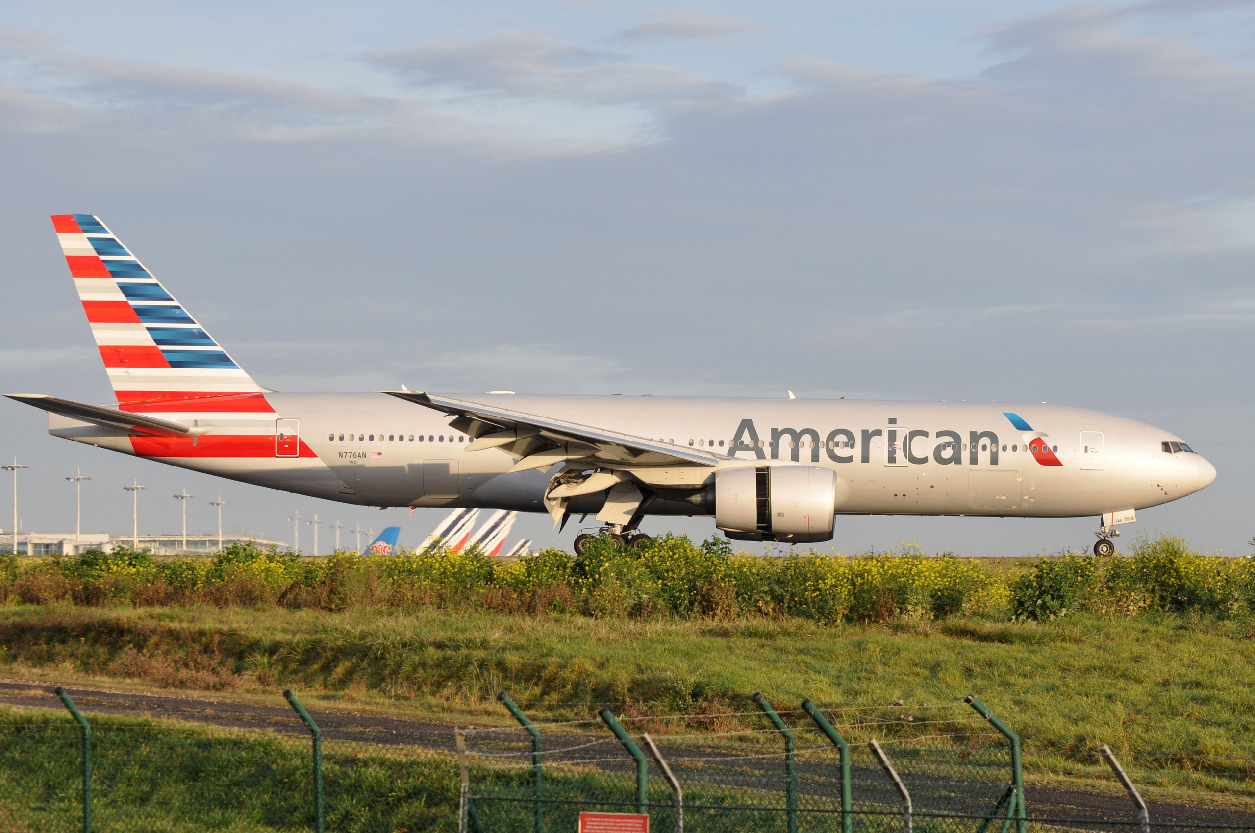 American Airlines Boeing 777-200ER landing in Paris, France.