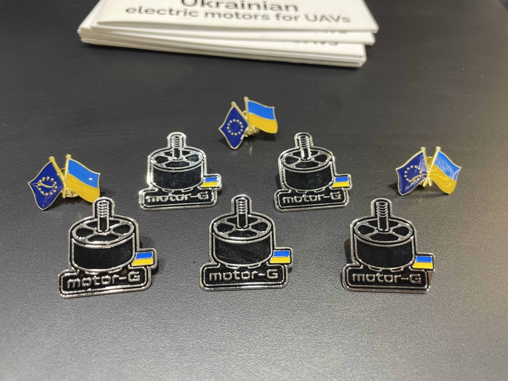 Motor-G pins as seen at Eurosatory